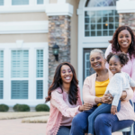 Family in front of house